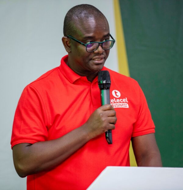 Telecel Ghana’s Head of SME, Alfred Neizer speaks at the 10th Rural Banking Week Celebration in Ho on strengthening financial participation.
