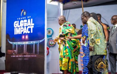 Asantehene Otumfuo Osei Tutu II unveils the commemorative anniversary book, 70 Years of Global Impact, which featured Telecel CEO, Ing. Patricia Obo-Nai.