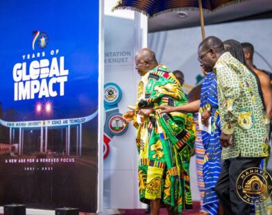 Asantehene Otumfuo Osei Tutu II unveils the commemorative anniversary book, 70 Years of Global Impact, which featured Telecel CEO, Ing. Patricia Obo-Nai.